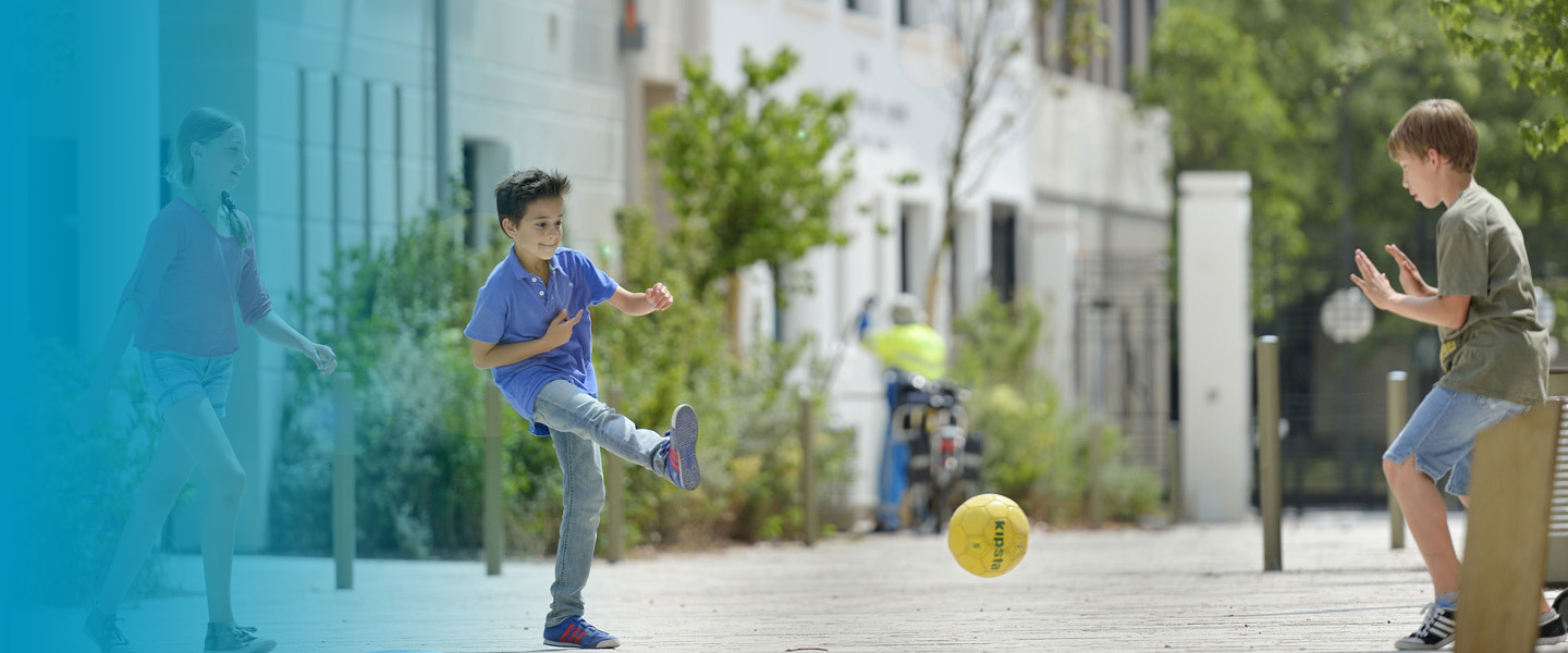 Photo of children playing in safe city